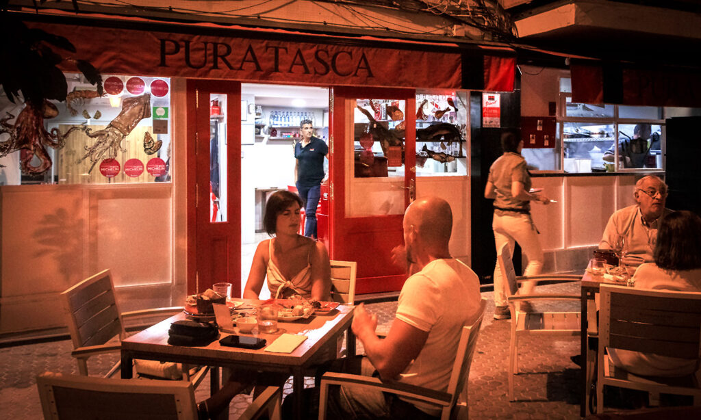 You'll eat really good tapas at Puratasca in the Triana district.