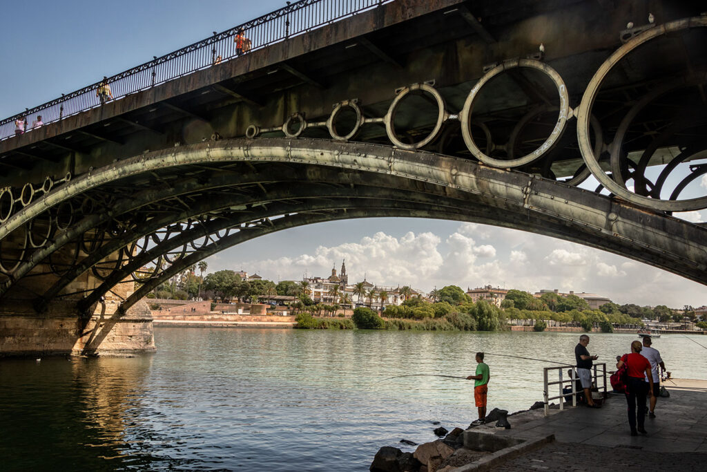 The Triana Bridge leads to the Triana district of Seville.