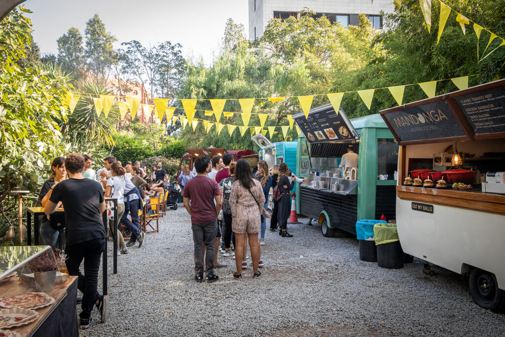 Eat lots of delicious street food and listen to music at Barcelona's Palo Alto market.