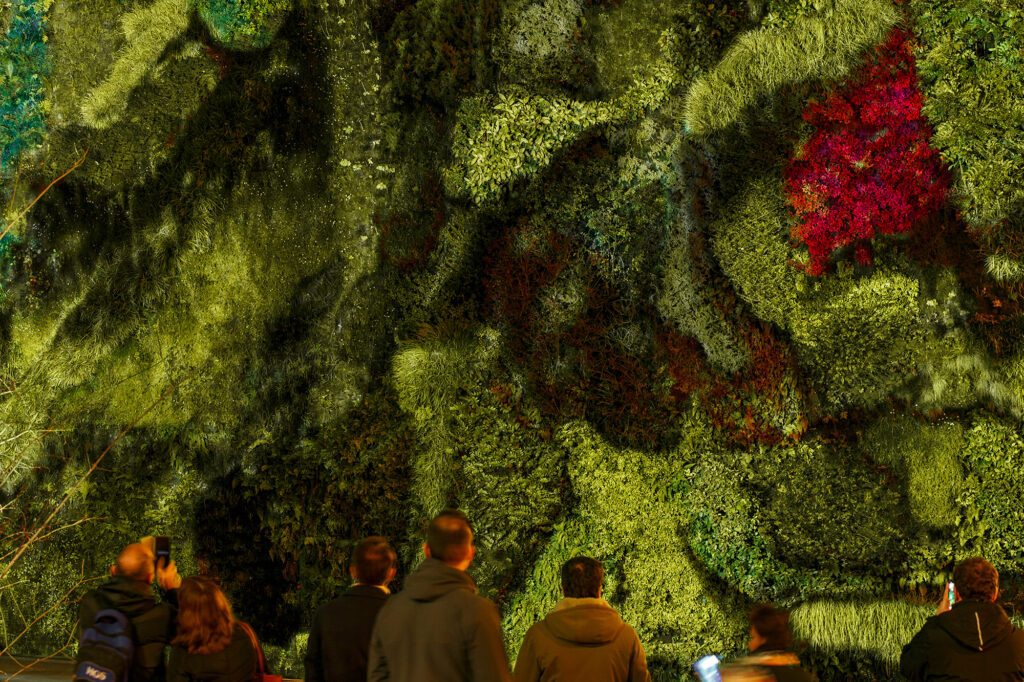Spanish design studio MAYICE has created an impressive light installation on the vertical garden of Caixa Forum for Madrid Design Festival 2020
