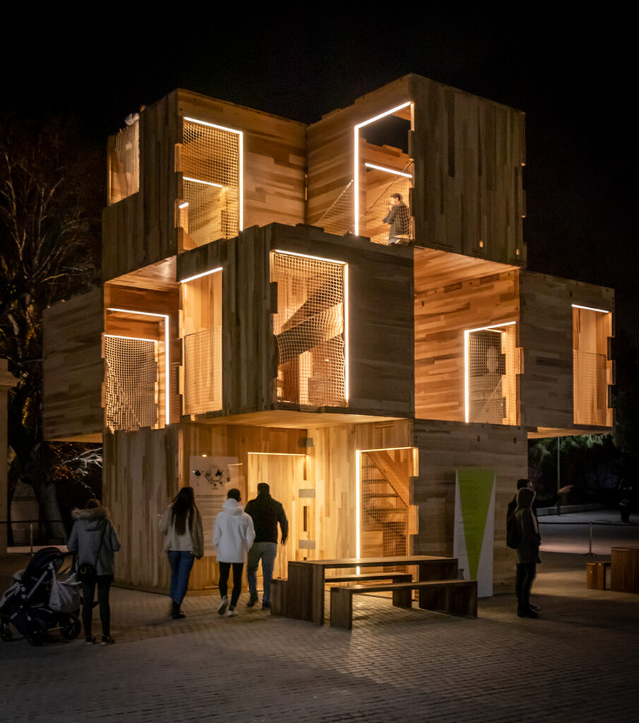 Spanish design festival focuses on sustainability and cultural history - sustainable cube house on the river of Madrid.