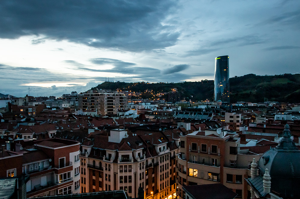 The rooftop terrace at the Ercilla Hotel in Bilbao is a great place to enjoy views over Bilbao at night.