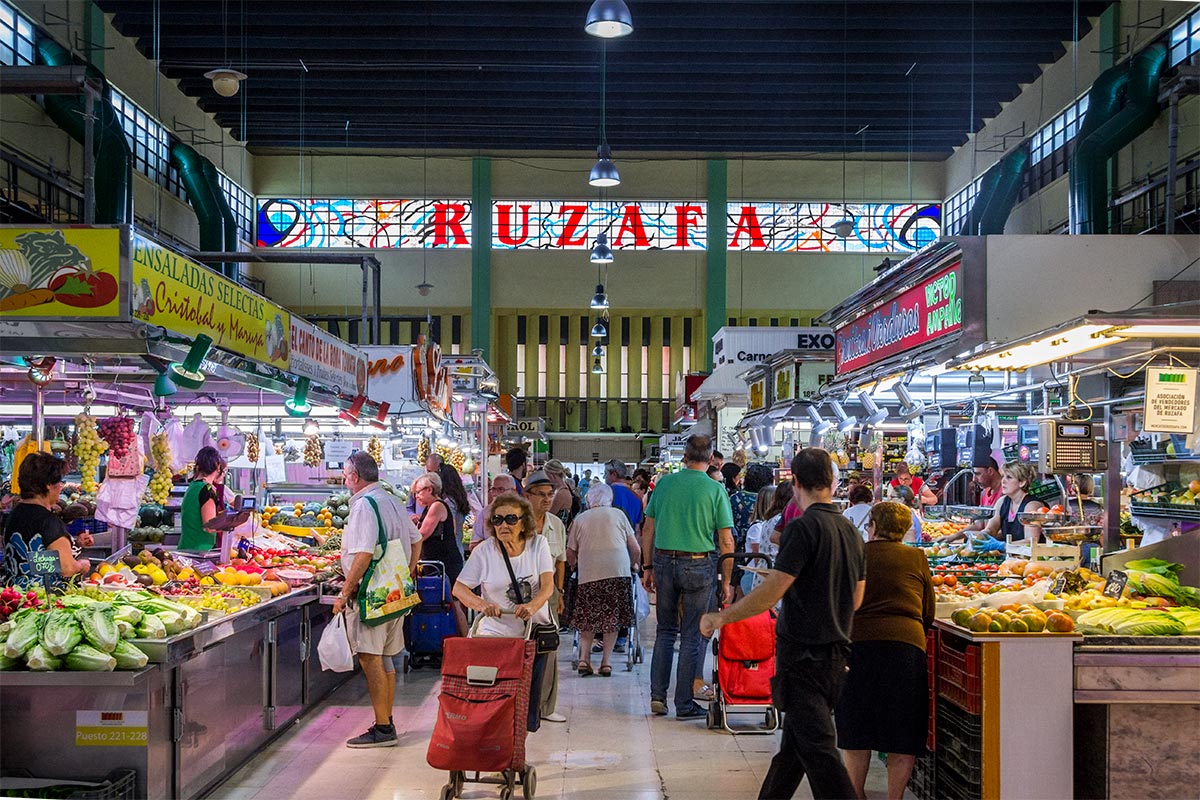 Go to the food market with the locals in the Ruzafa district of Valencia.