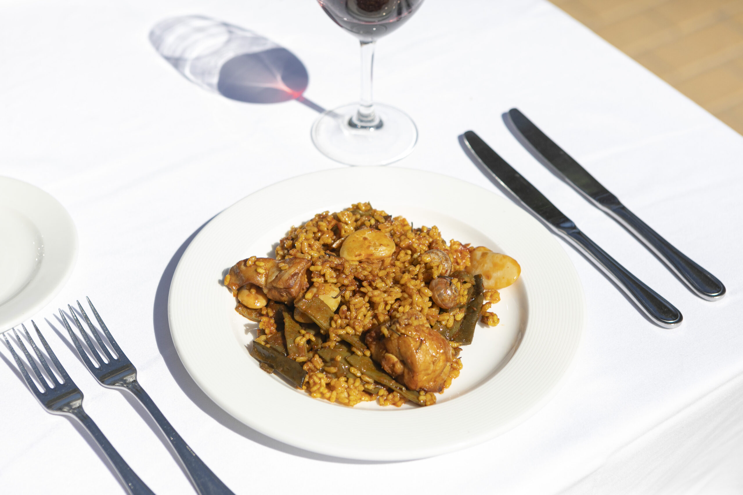 A classic paella in Valencia is with rice, chicken, rabbit, snails and beans.