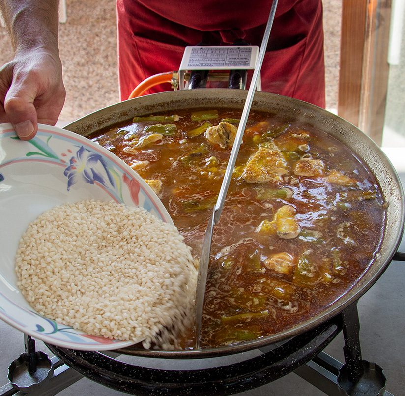 Aprende el arte de hacer paella en Huerta, en Valencia.